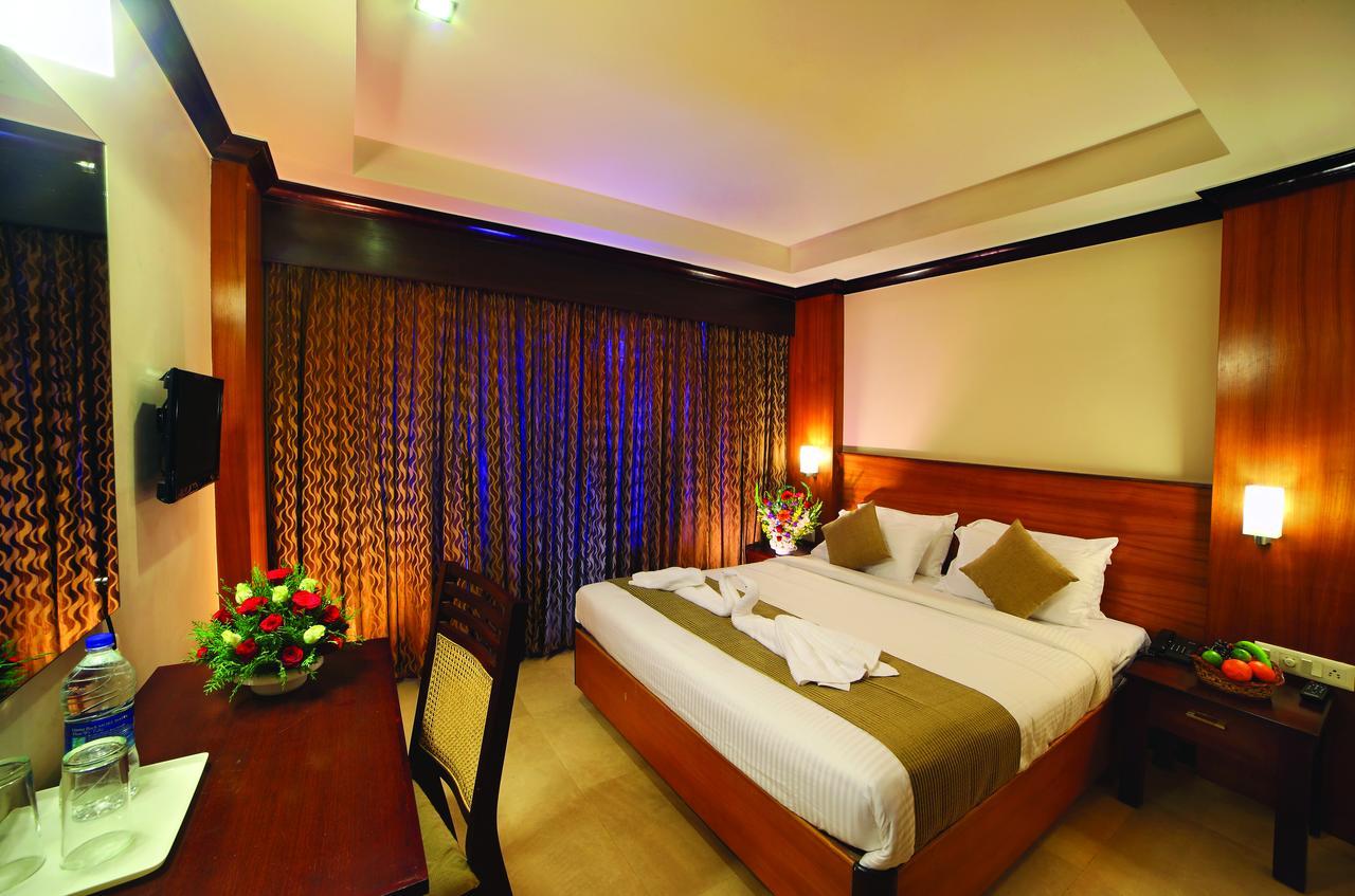 Hotel Zodiac Regency Coulão Exterior foto
